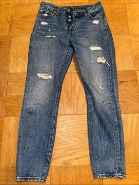 Distressed Blue Denim Button-Fly Jeans